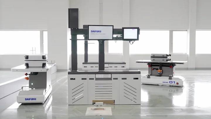 White automated handling machines in a bright clean room