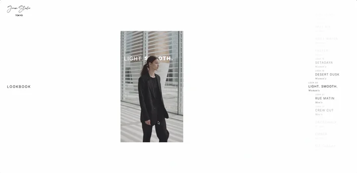 Look 20 “Light. Smooth.” — black suit by louvred windows, at rest