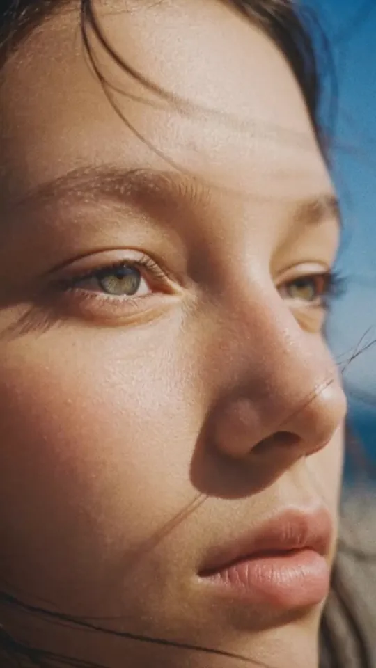 Close-up of a woman's face in soft daylight