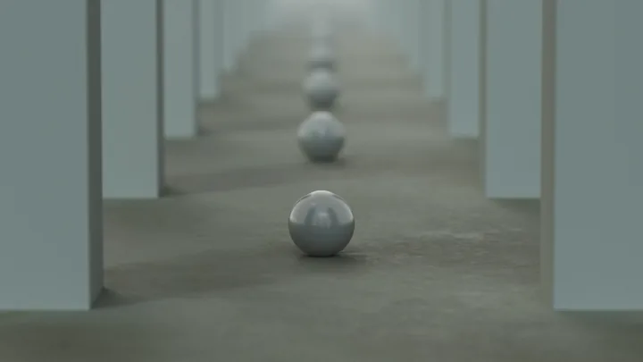 A sphere rolling down a long corridor of columns