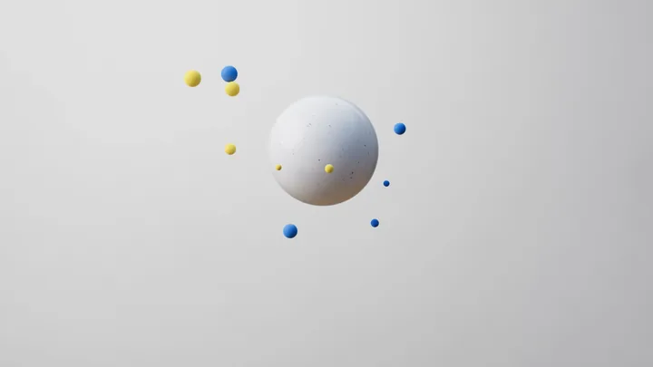 A white sphere orbited by tiny blue and yellow dots