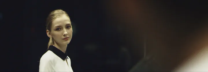 The woman in a white blouse at night