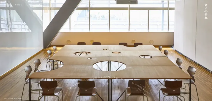 鈴木工藝社 website — Furniture for University of Tokyo, a long table with round cut-outs
