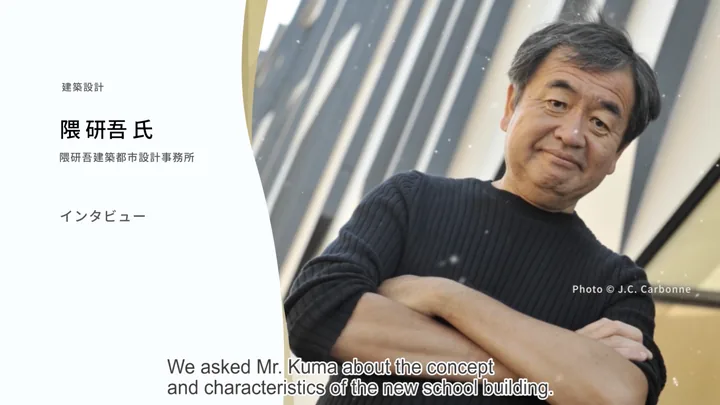 Architect Kengo Kuma, arms crossed, interviewed about the new building