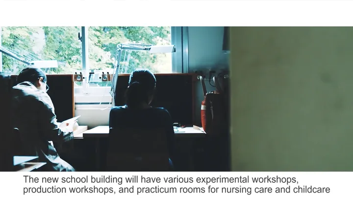 Students in a dim workshop room
